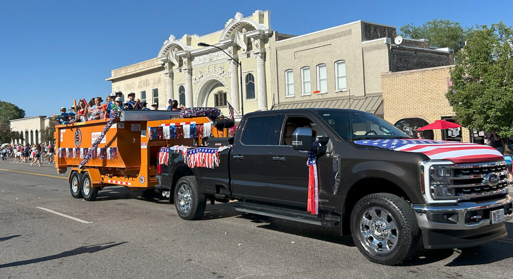 Sanpete Dumpsters in Gunnison Independence Day Parade with the Yard Goats
